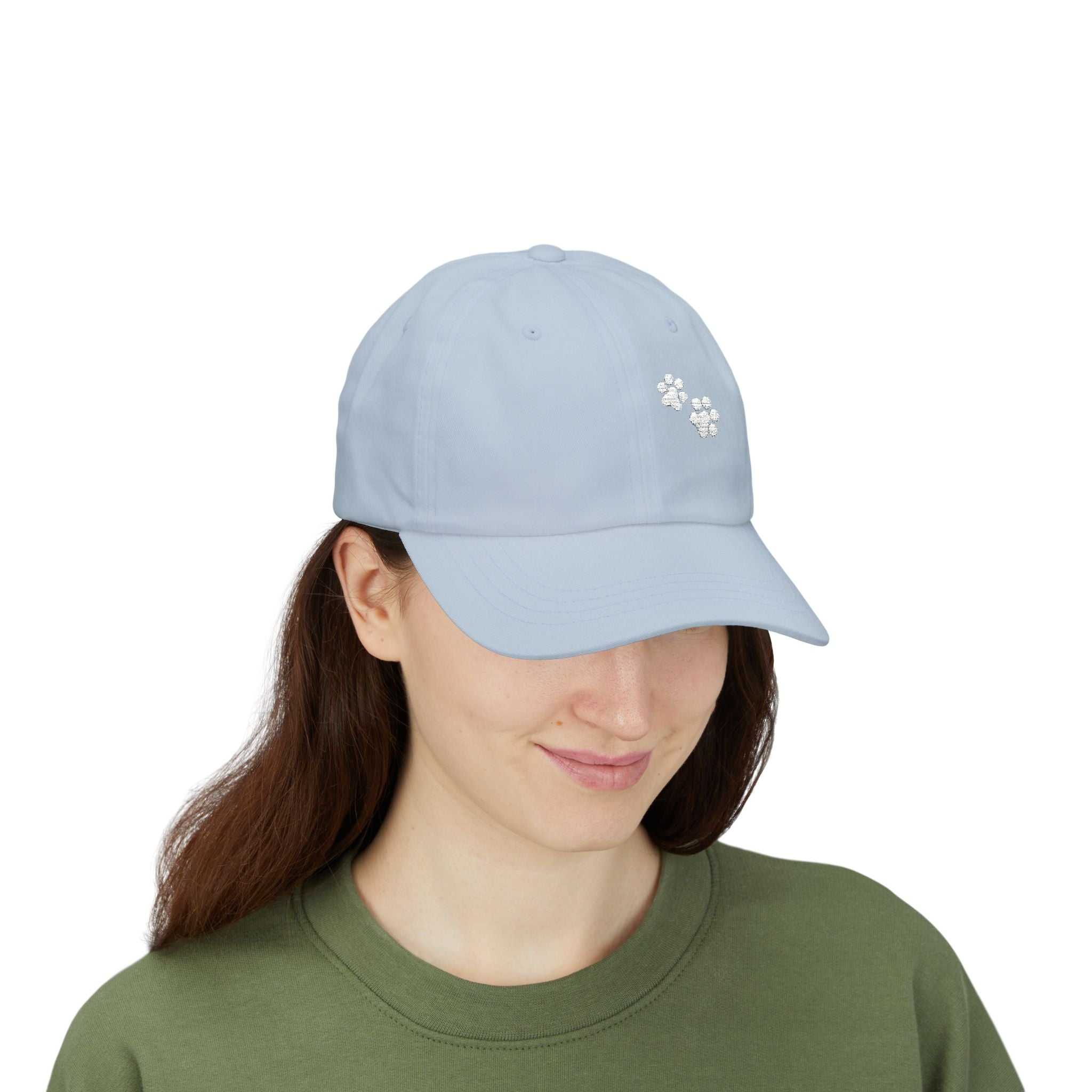 Classic blue dad cap with paw print design, featuring relaxed fit and adjustable closure, perfect for casual wear.