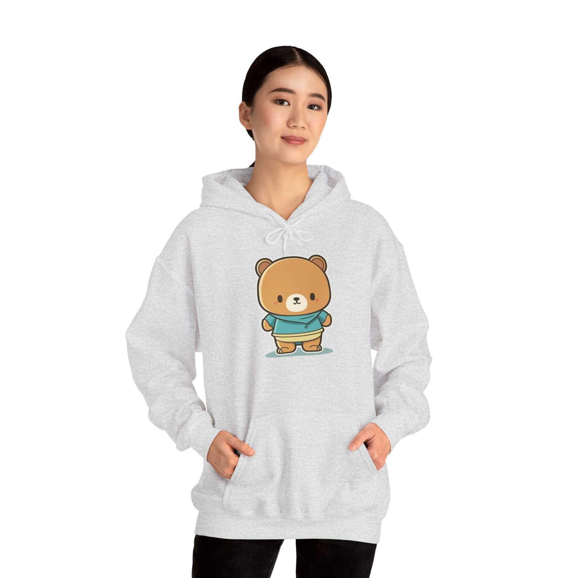 Heavy hooded teddy sweatshirt with cartoon bear design, comfortable cotton-polyester blend, perfect for cold weather.