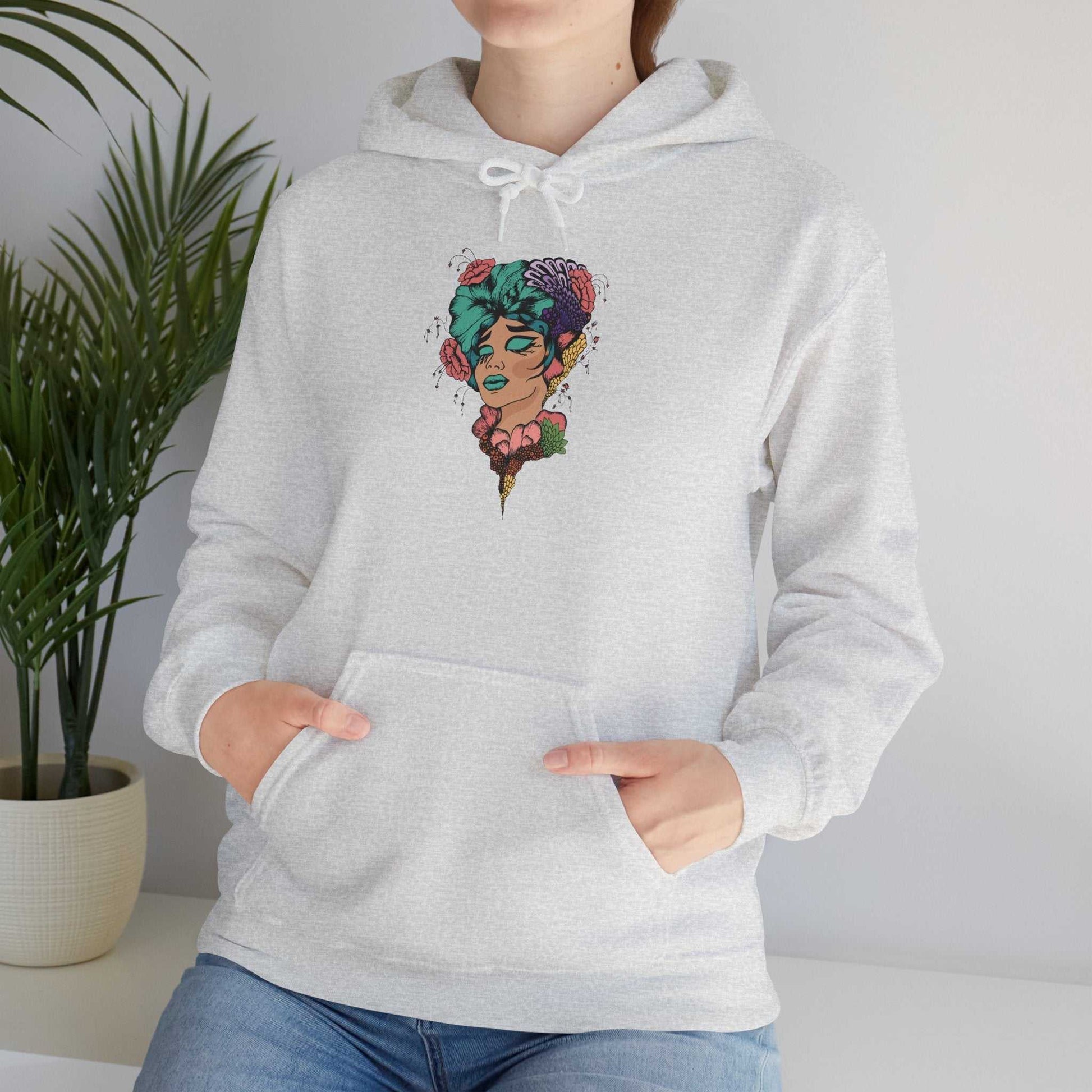 Boho style hooded sweatshirt with colorful graphic design, featuring cozy kangaroo pouch pocket and adjustable drawstring hood.