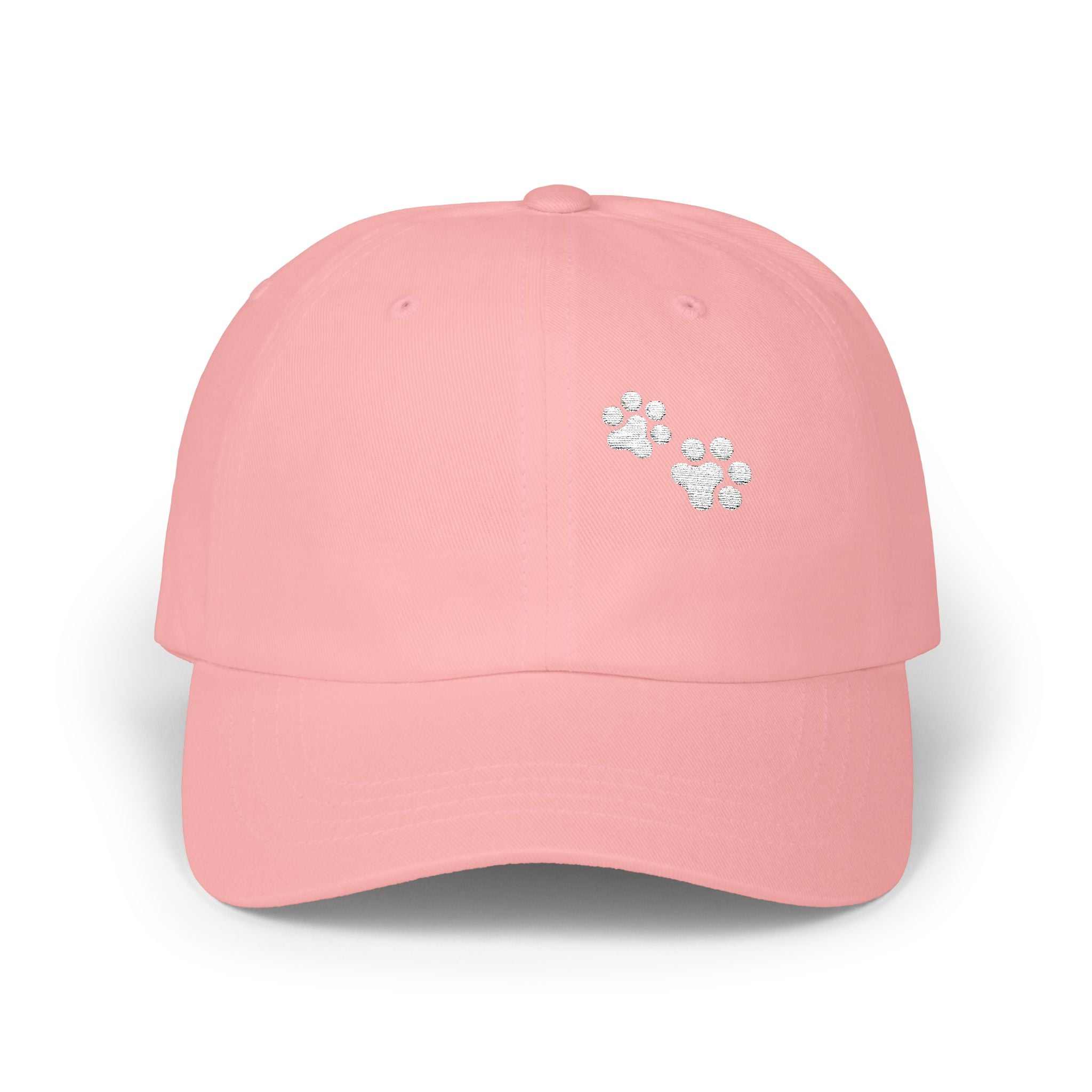 Pink dad cap with paw print design, casual and comfortable fit, perfect for pet lovers.