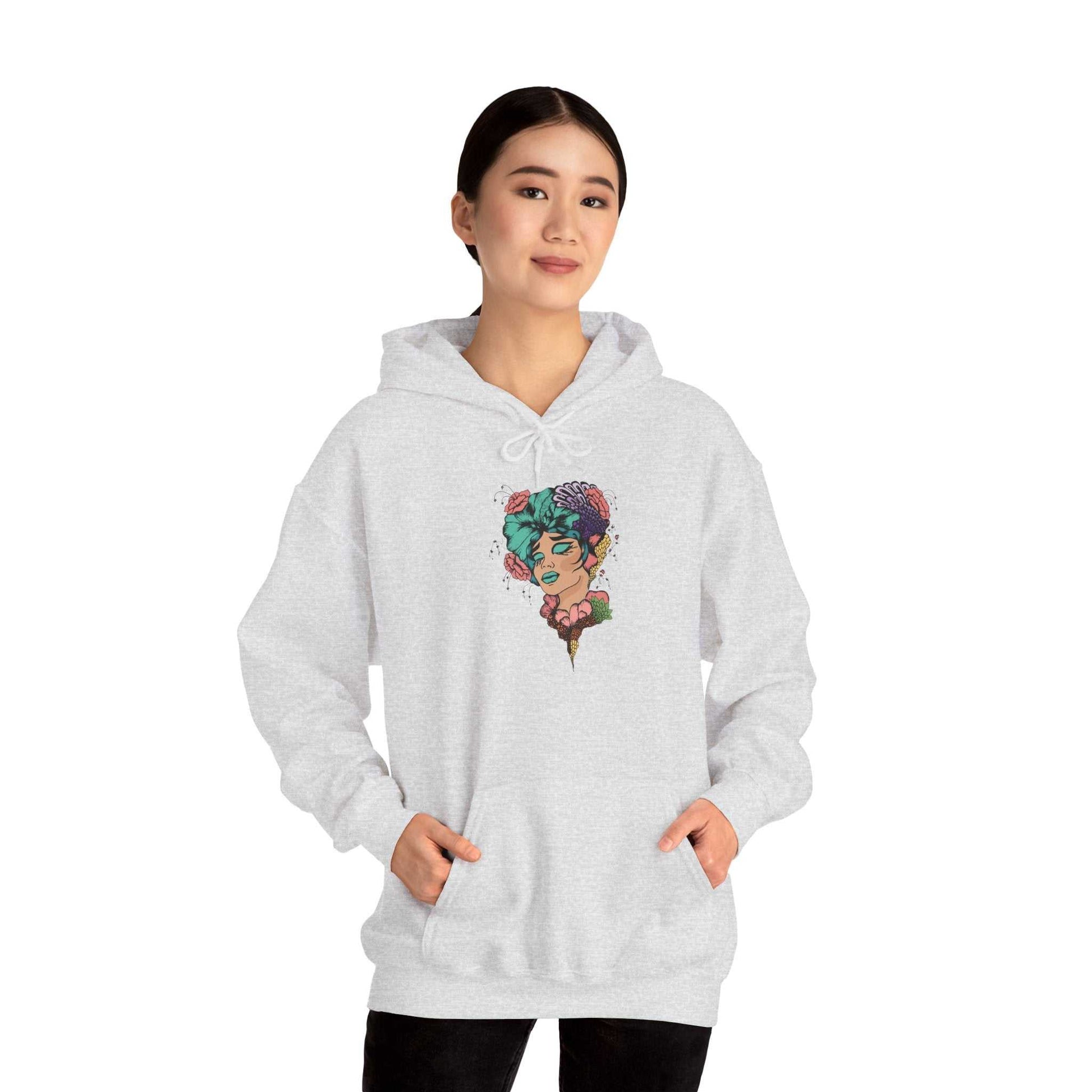 Unisex boho style hooded sweatshirt with artistic design, featuring a drawstring hood and kangaroo pouch pocket.