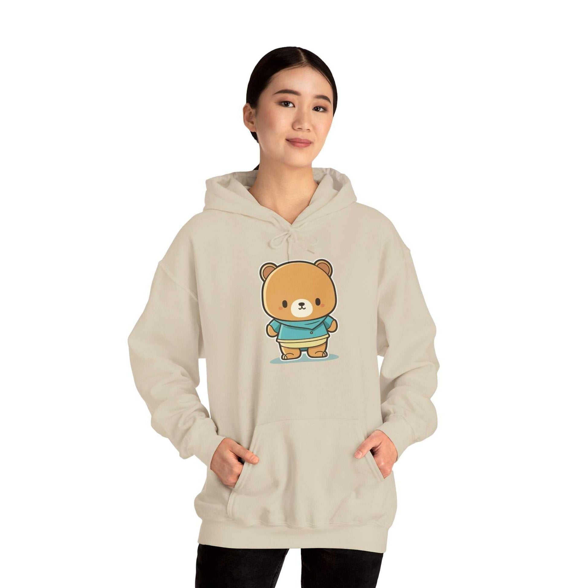 Heavy Hooded Teddy Sweatshirt with kangaroo pocket and teddy bear graphic, perfect for warmth and comfort.