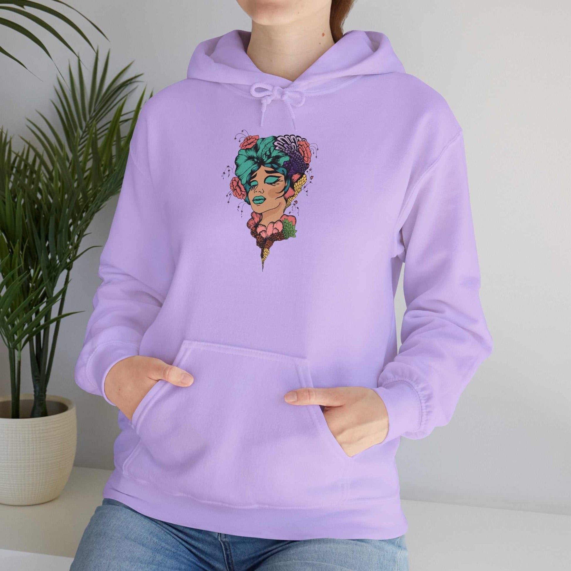Boho style hooded sweatshirt with vibrant design, cozy fit, and kangaroo pocket.