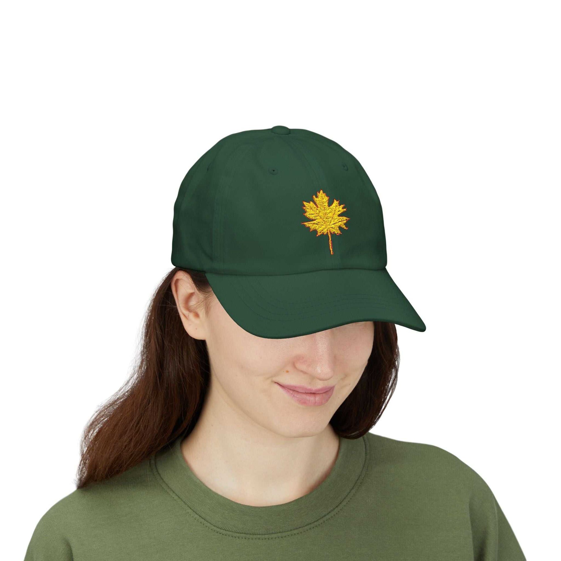 Green Maple Leaf Dad Cap with gold maple leaf embroidery, casual unstructured design, perfect for everyday wear.
