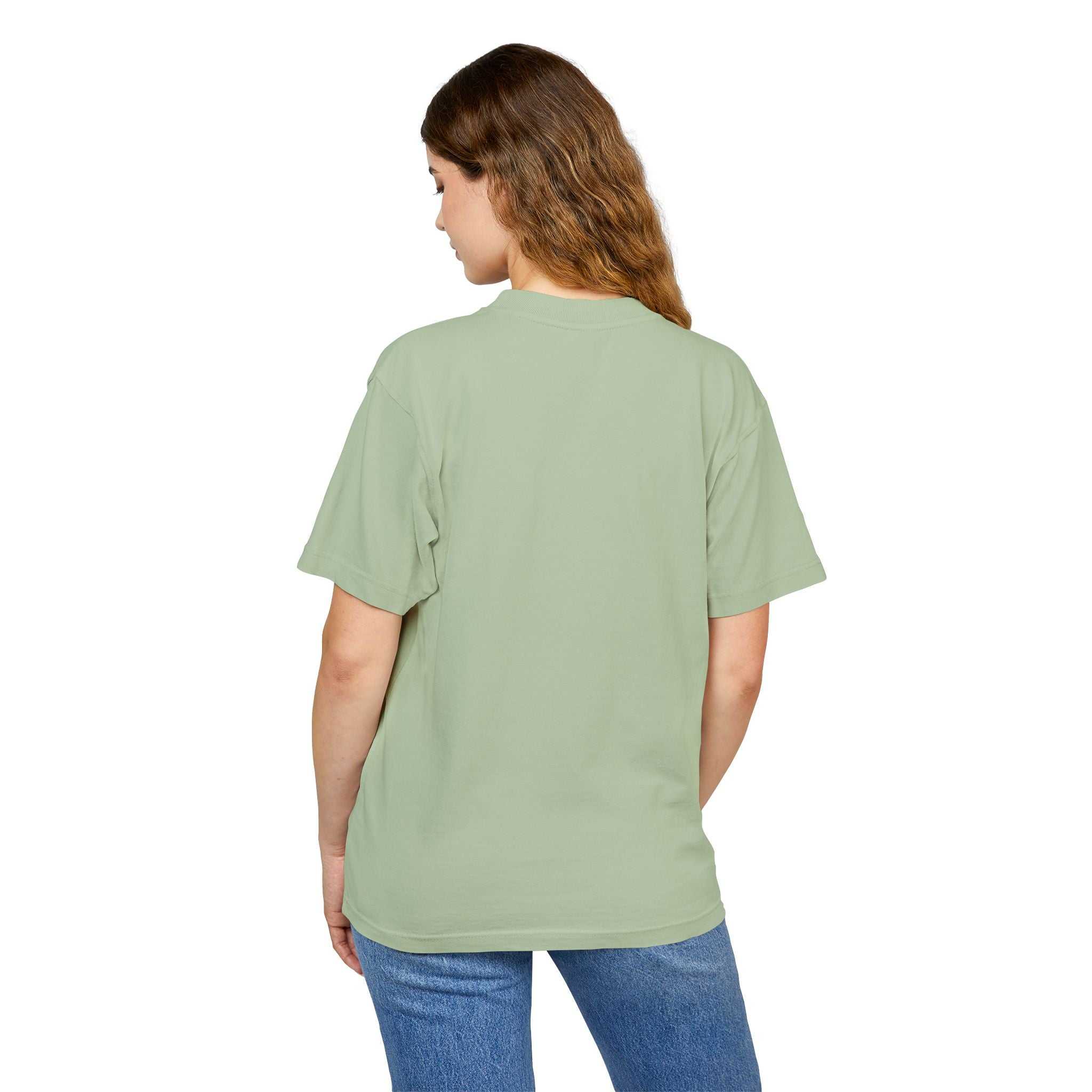 Unisex Urban Heavy Tee in green, showcasing a comfortable boxy fit and crafted from 100% combed cotton.
