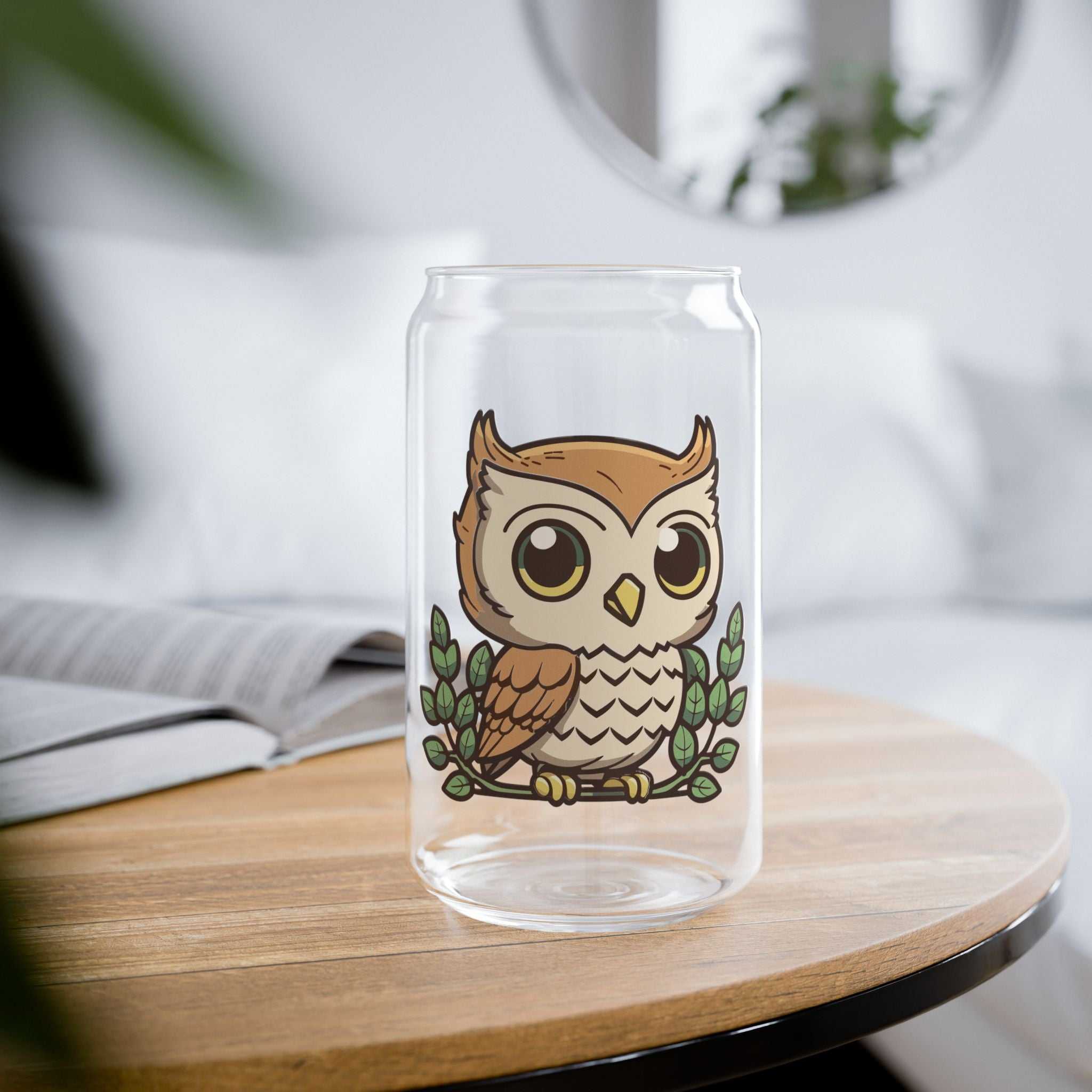 Cute owl sipper glass on wooden table, vibrant 16oz glassware ideal for nature lovers.
