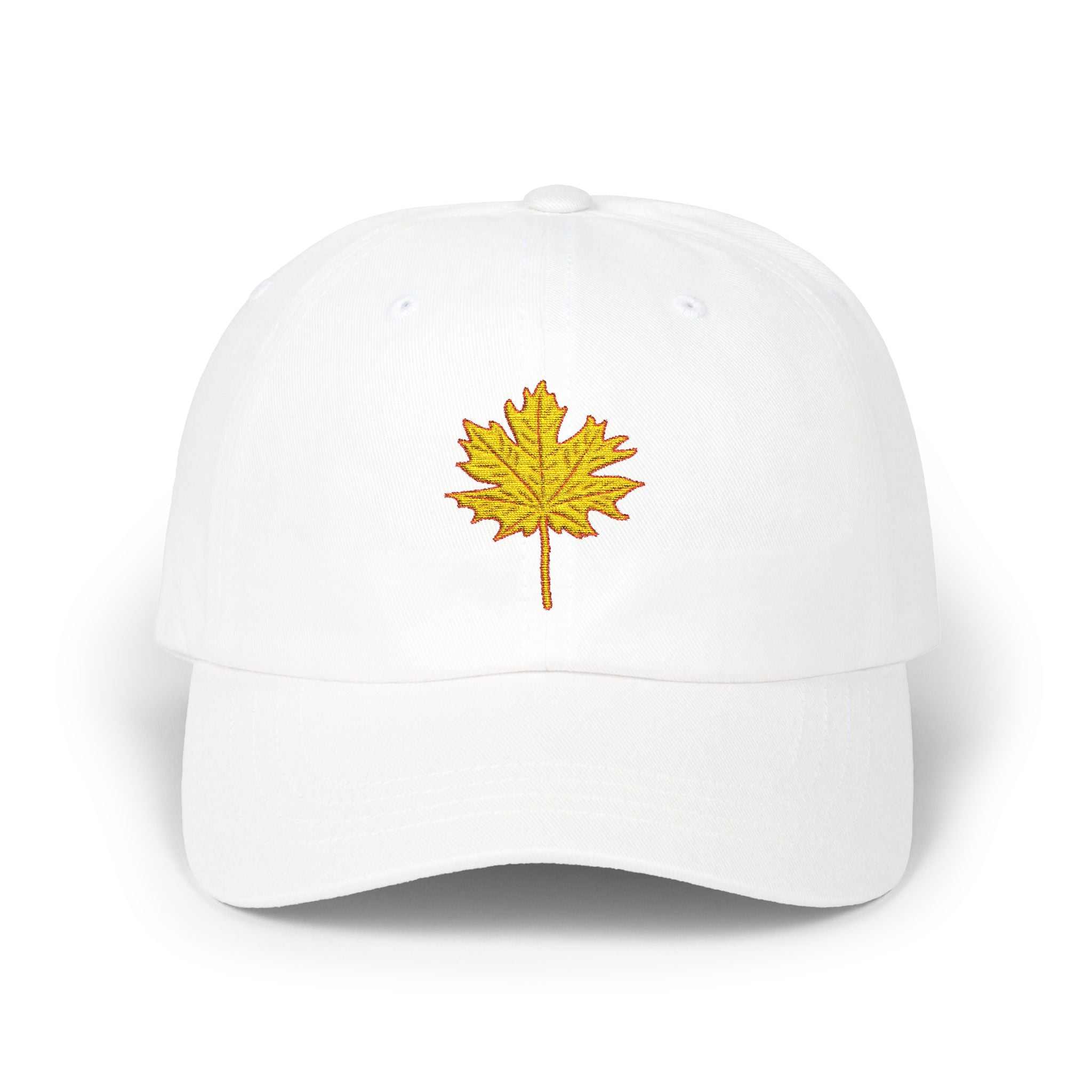 White Dad Cap with embroidered yellow maple leaf design, casual unstructured fit.