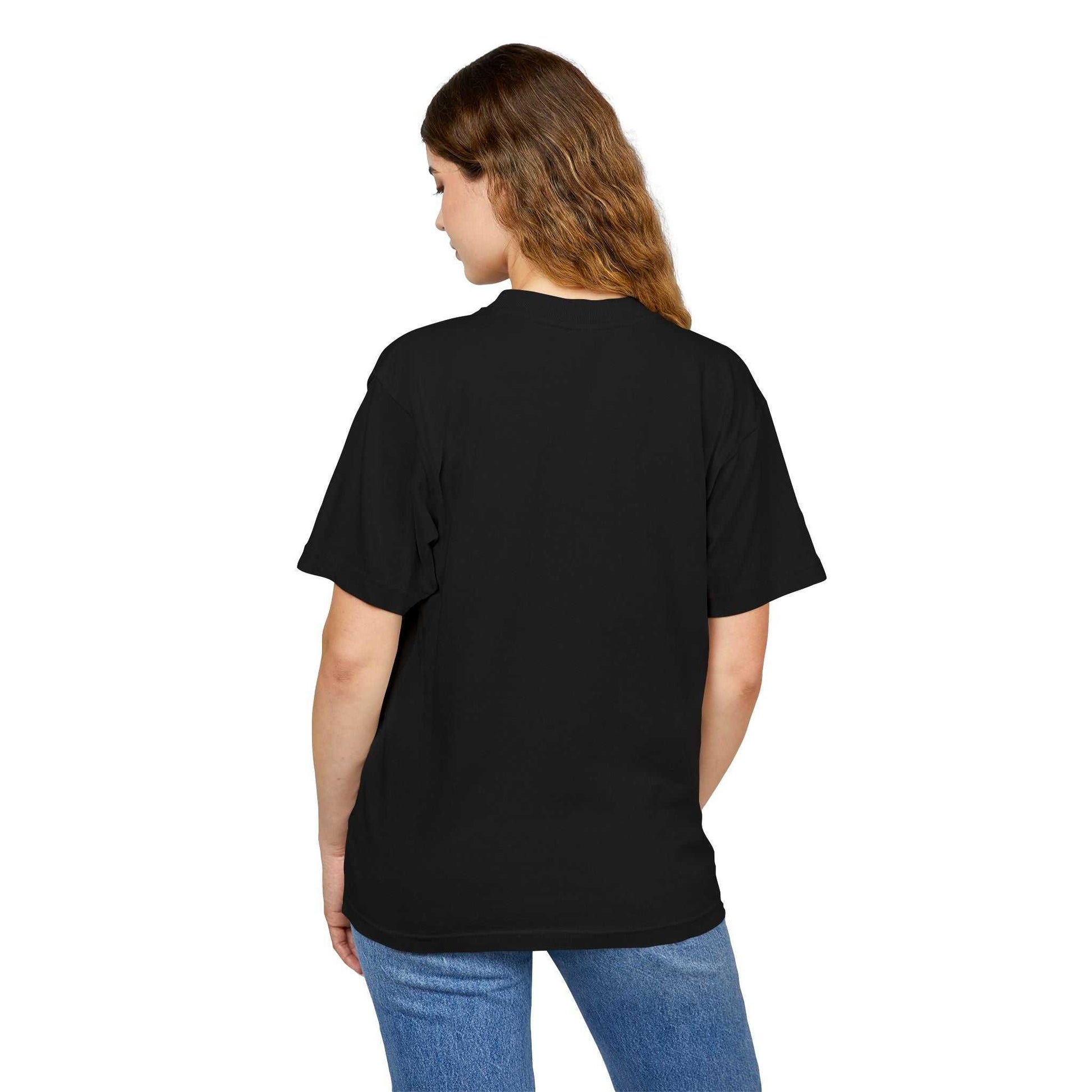 Unisex model wearing Urban Heavy Tee in black, showcasing a relaxed, comfortable fit suitable for casual outings.