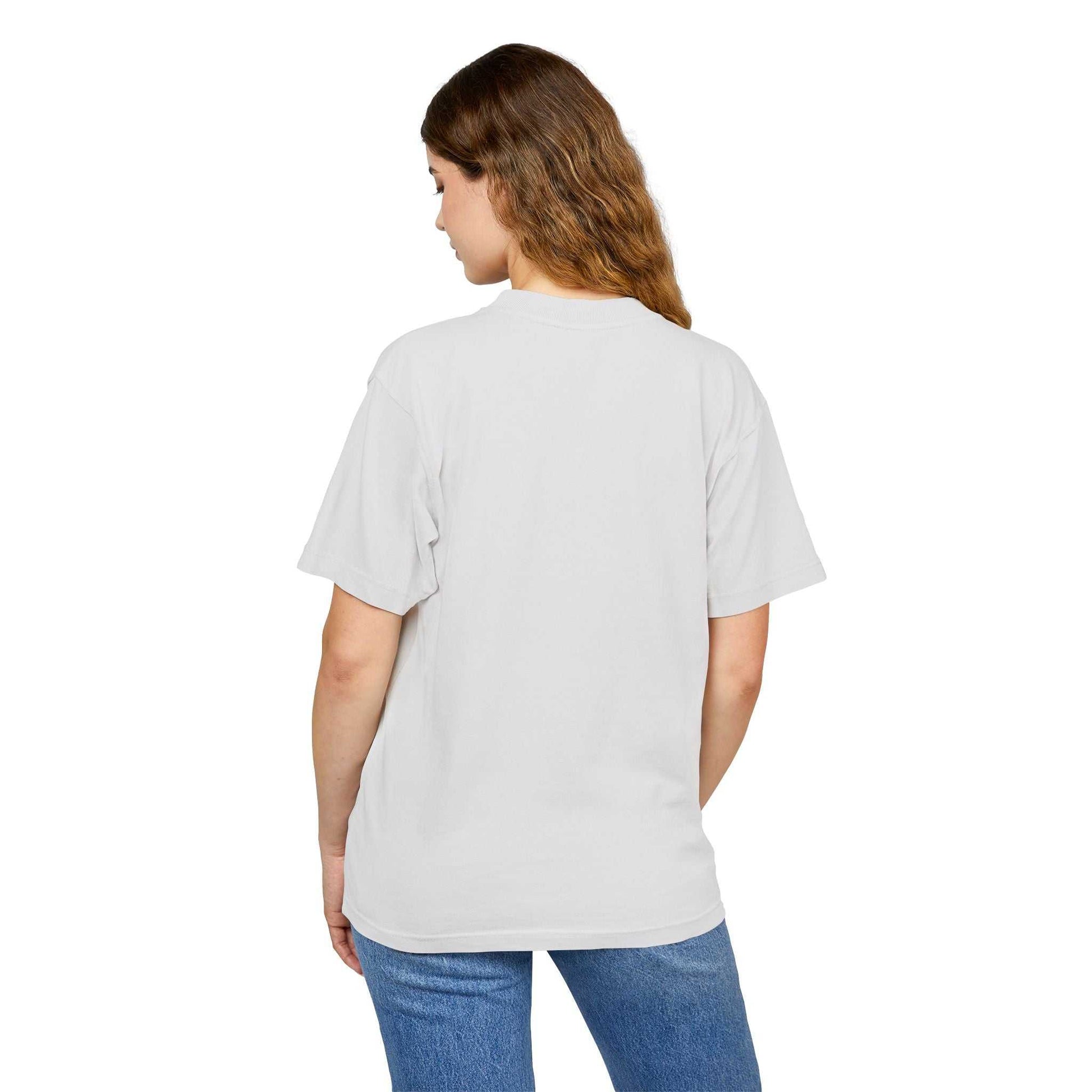 Unisex model wearing Urban Heavy Tee in white, back view showing relaxed fit and short sleeves.