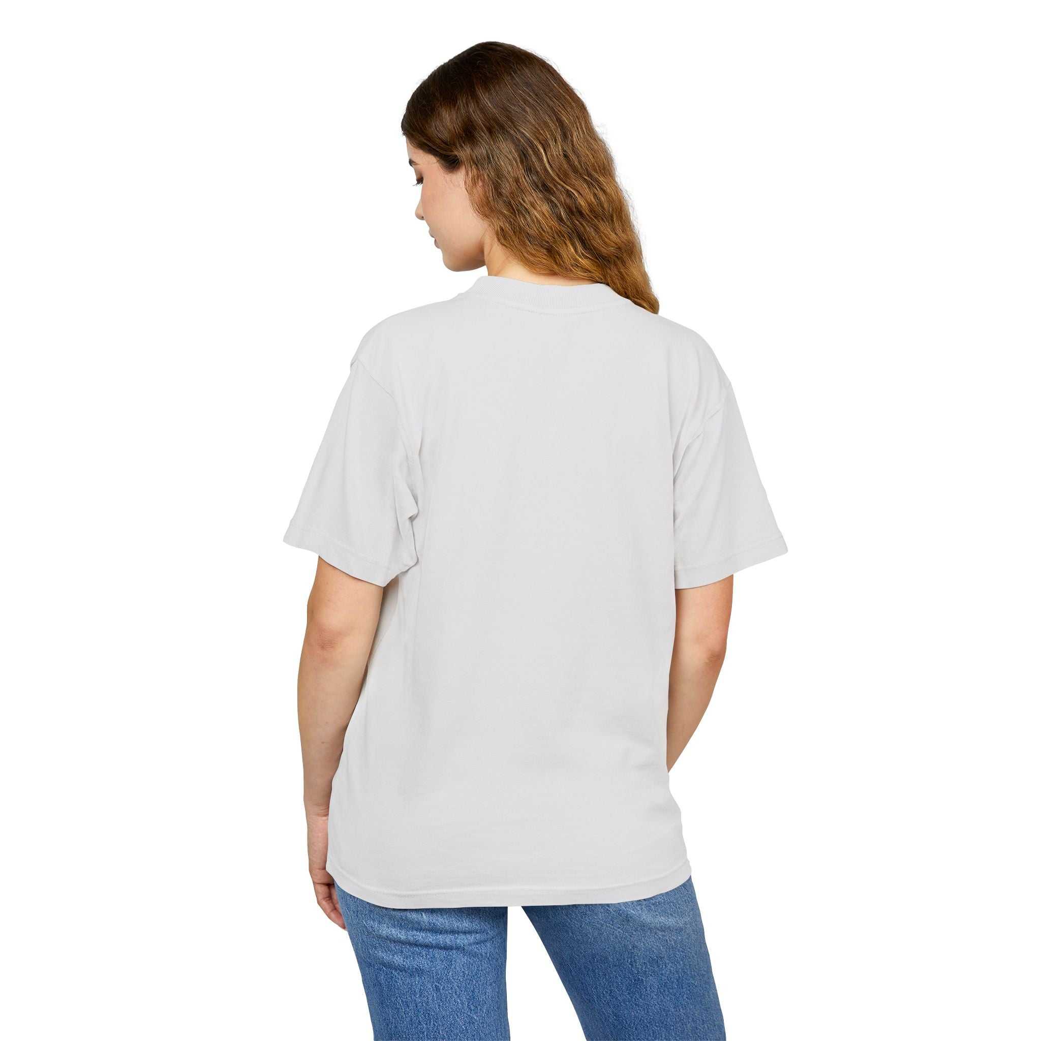 Unisex model wearing Urban Heavy Tee in white, back view showing relaxed fit and short sleeves.