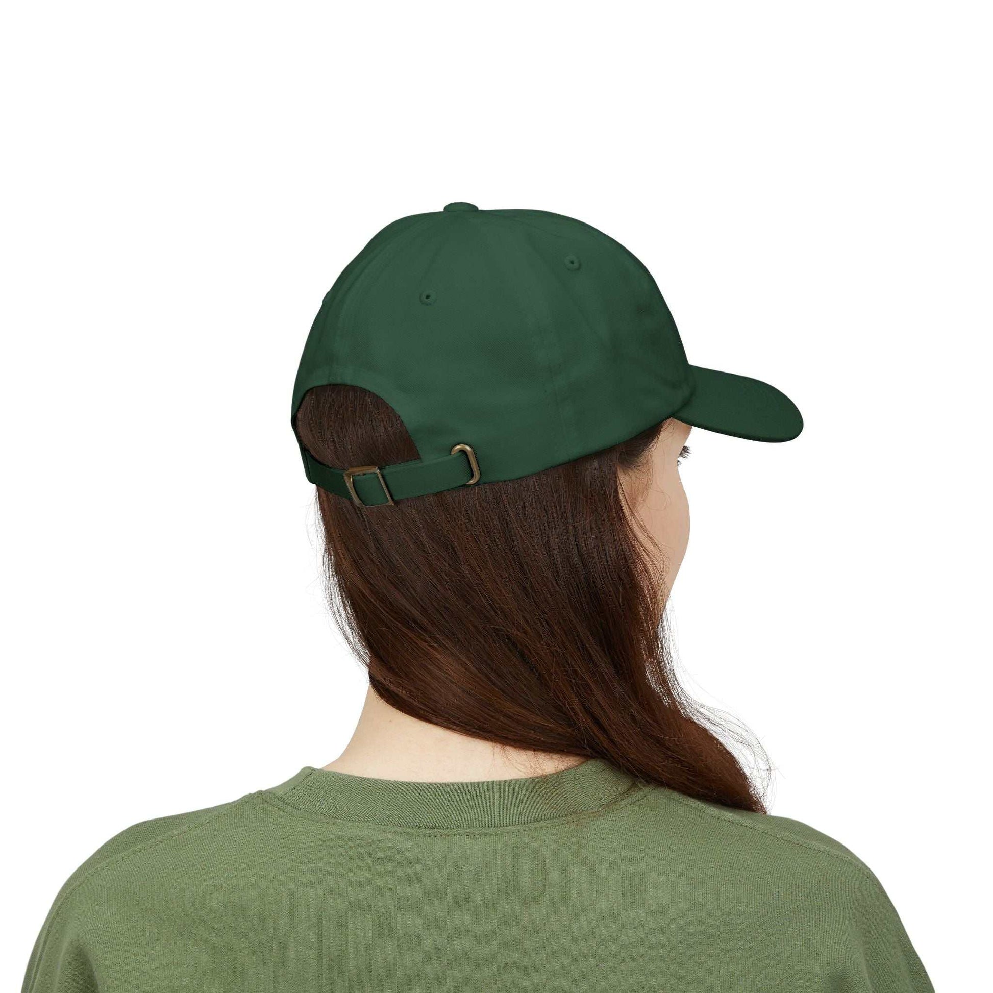Green Maple Leaf Dad Cap with adjustable snap closure, worn by a person with long hair, showcasing a relaxed style.